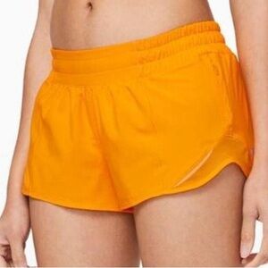 orange lululemon hotty hot shorts